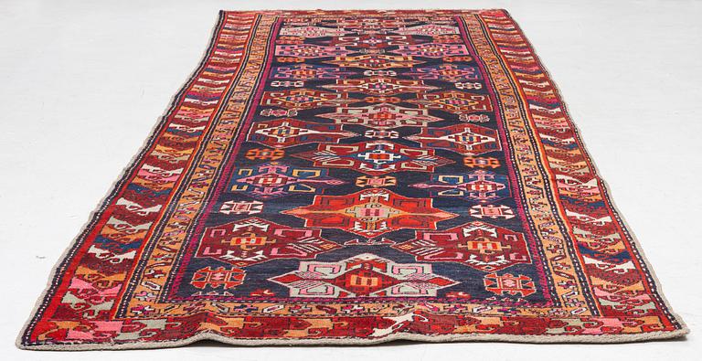 A semi-antique Anatolian runner, c. 409 x 159 cm.