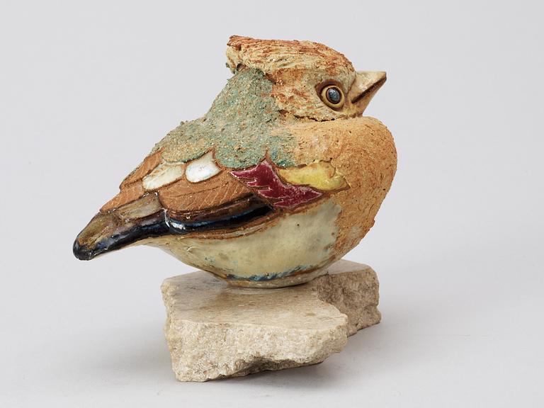 A Tyra Lundgren stoneware figure of a bird.