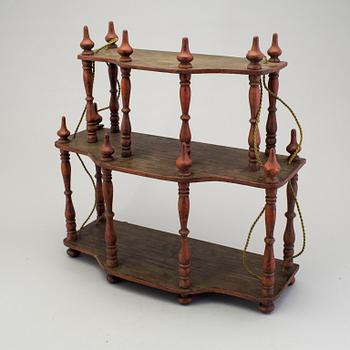 A painted folk art shelf for prayer books 19th century.