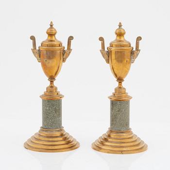 A pair of brass cassolettes from Skultuna Bruk.