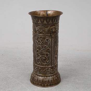 A 19th century brass umbrella stand.