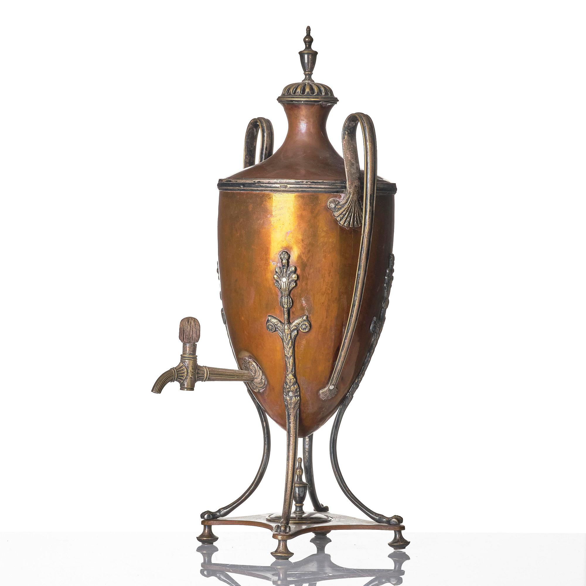 A George III copper and silvered-brass hot water urn, late 18th century.