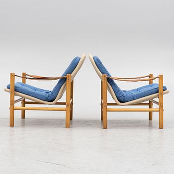 Bror Boije, armchairs, a pair, 'Junker"', Dux, second half of the 20th century.