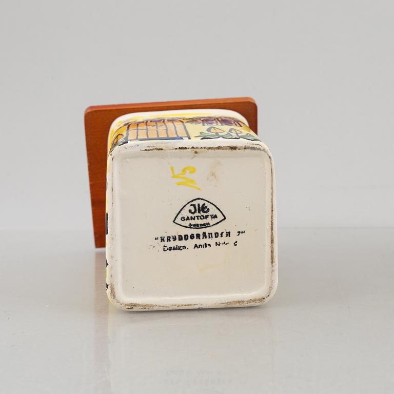 A set of five creamware jars with covers and a sugar caster,  including Anita Nylund, 'Vår lilla stad', Jie, Gantofta.