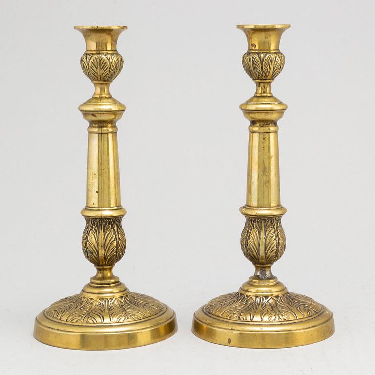 A pair of Empire bronze candlesticks, first half of the 19th century.