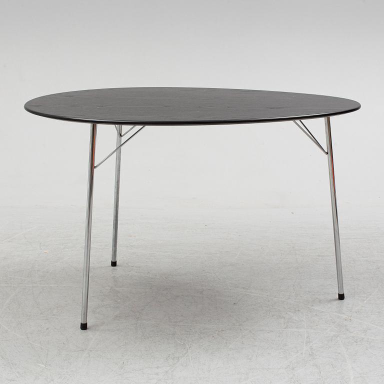 An Arne Jacobsen "Centenary Package" comprising three "Ant Chairs" and an eggshaped table, Fritz Hansen, Denmark.