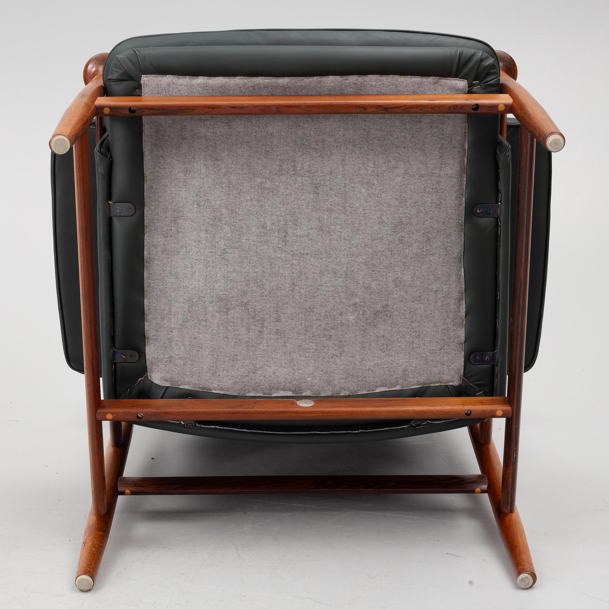 Finn Juhl, a 'Bwana' armchair and ottoman, France & Son, Denmark, 1960's.