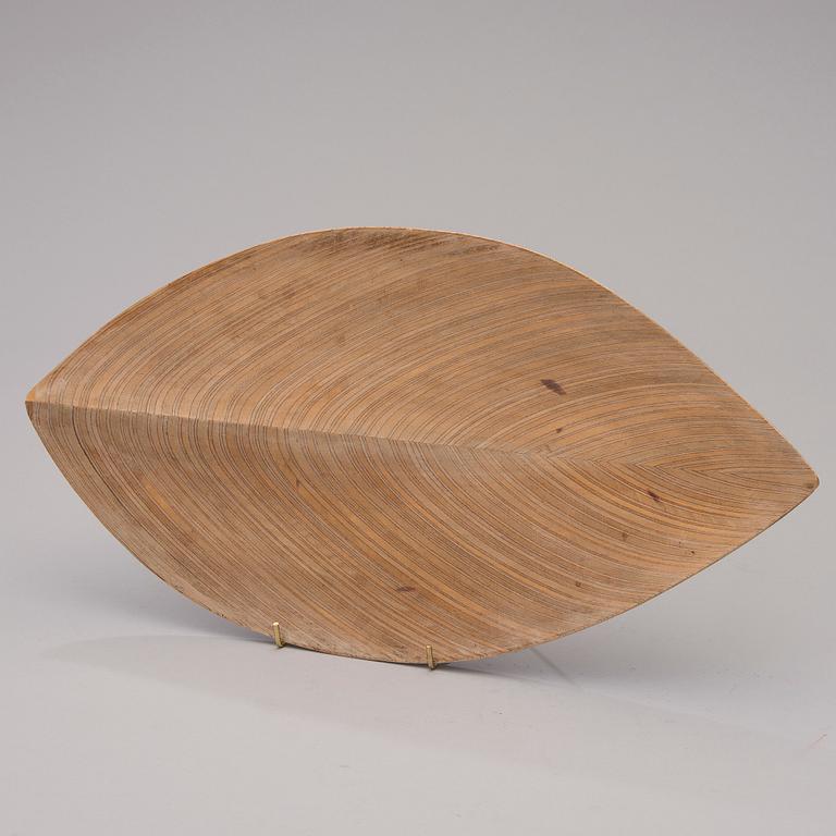 A 1950s plywood dish signed TW.