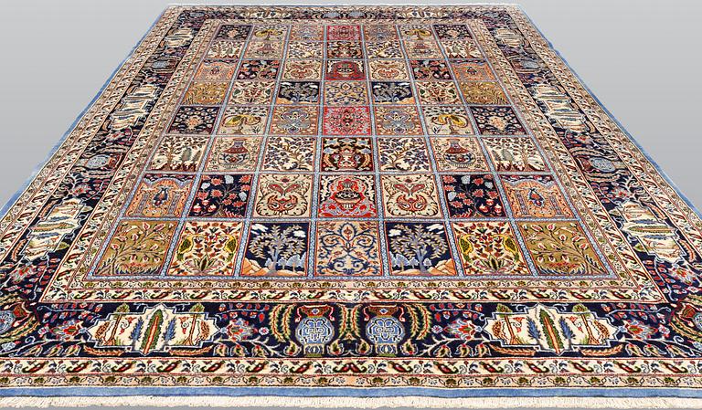 A Figural Sarouk carpet, c. 348 x 240 cm.
