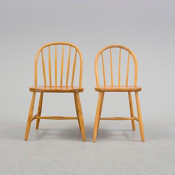 Seven matched mid 20th Century birch and beech chairs.