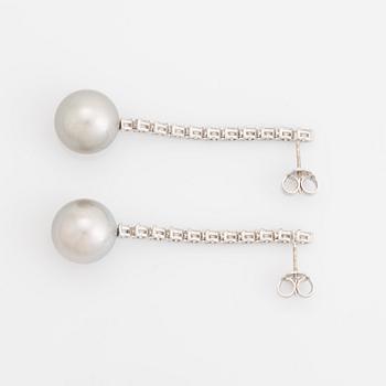 Tahit pearl and brilliant-cut diamond earrings.