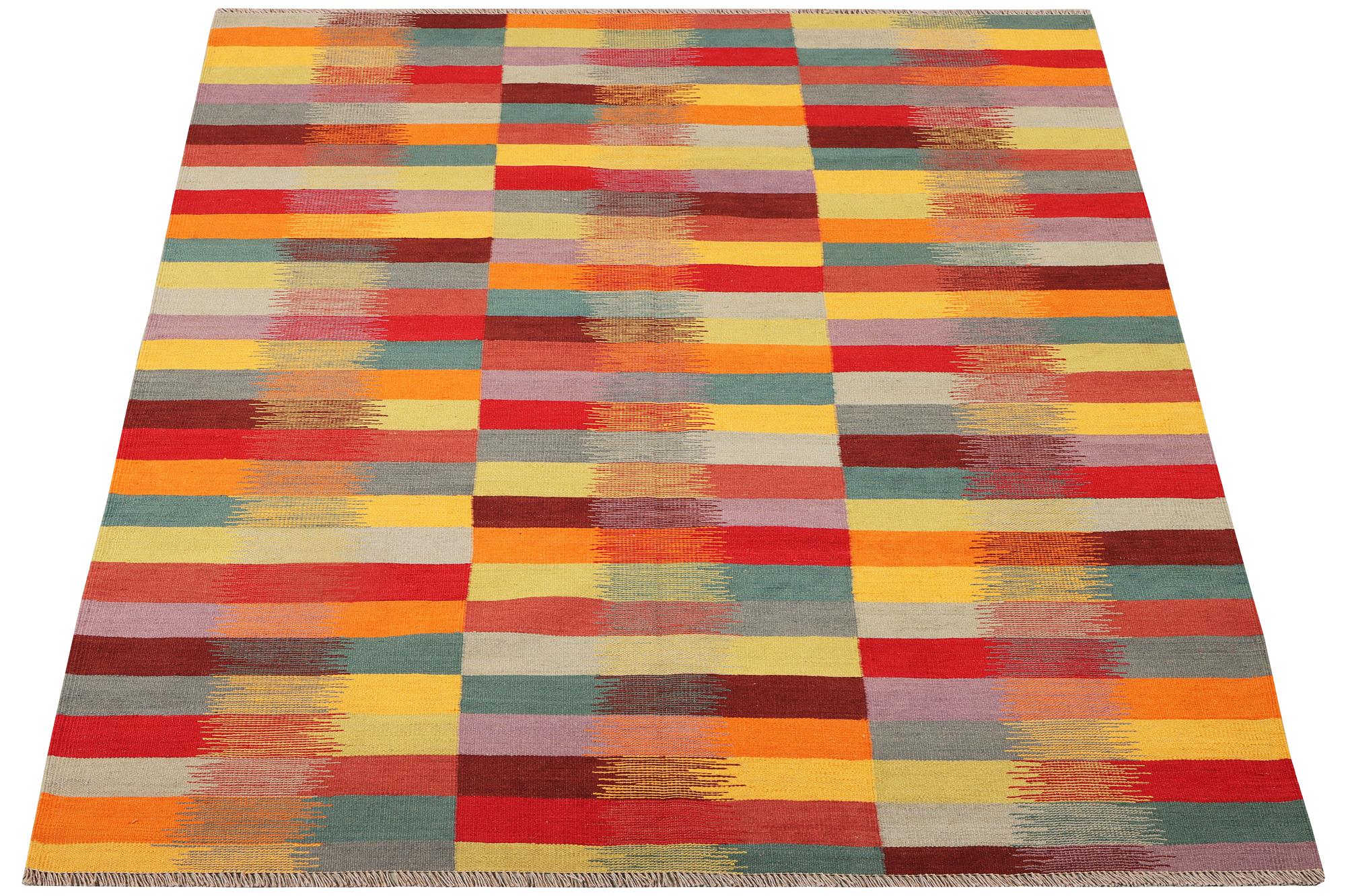 A Kilim rug, c. 232 x 168 cm.