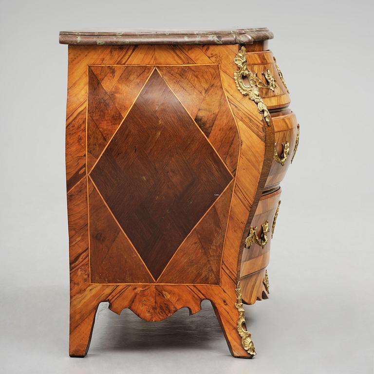 A rococo parquetry and gilt brass-mounted commode attrbuted to M. Engström (master in Stockholm 1758-97).