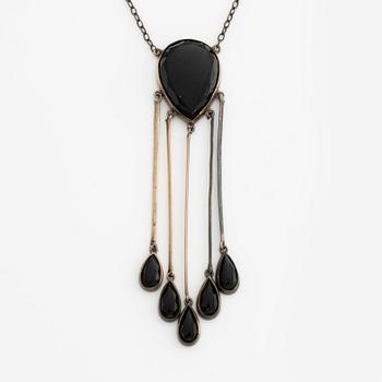 Necklace, silver with black stones.