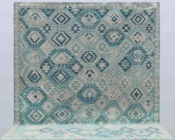 A Kelim carpet, 292 x 252 cm.