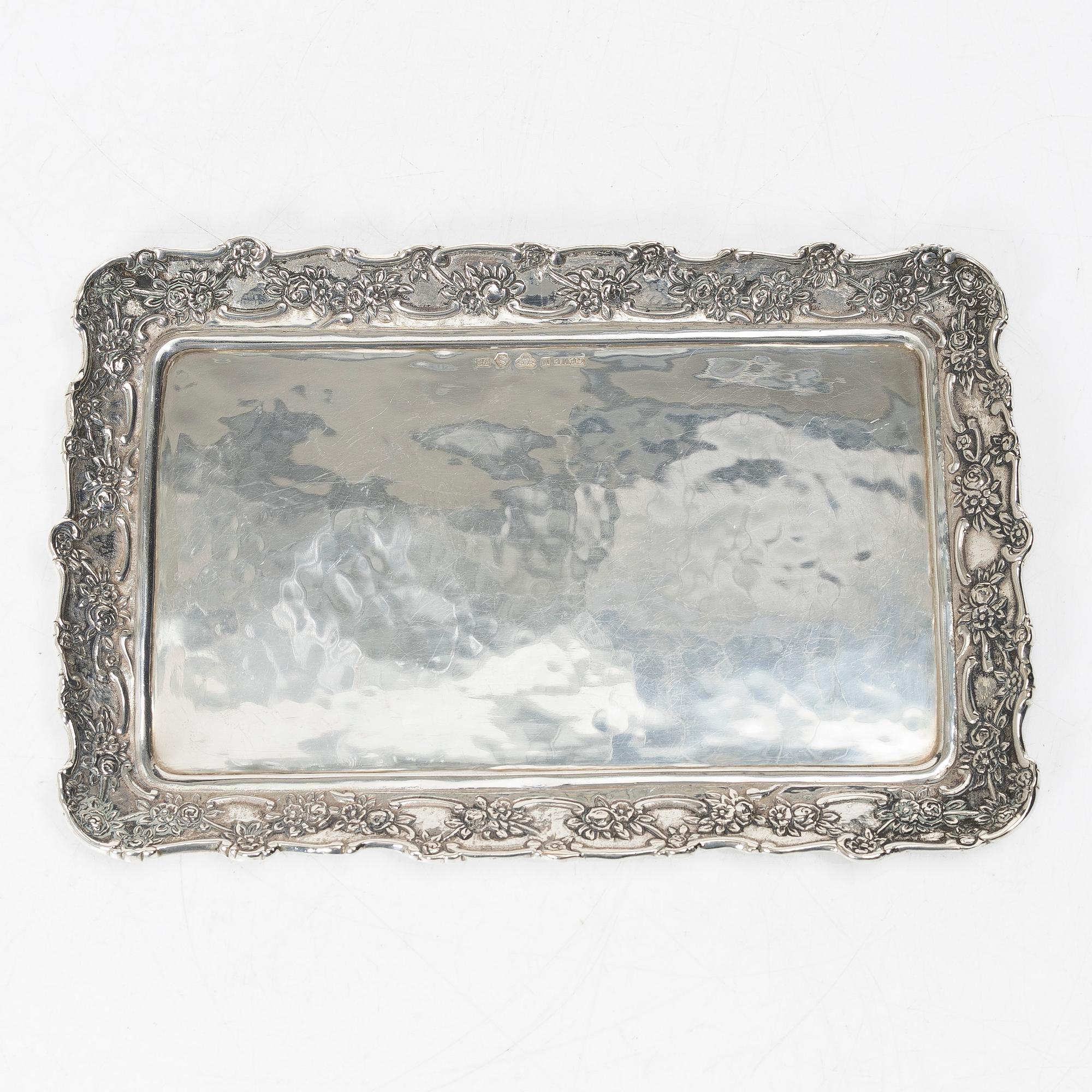 Two creamers, a tray, and a sugar tongs, silver, Rococo and Rococo style, 18th-19th century.