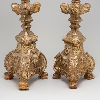 A pair of 18th century candlesticks.