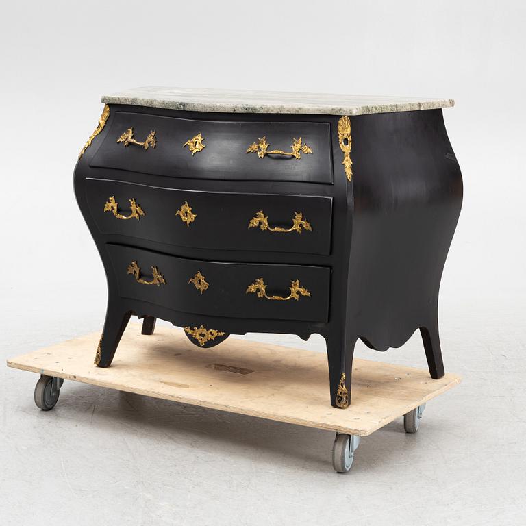 A Rococo style chest of drawers, mid 20th Century.