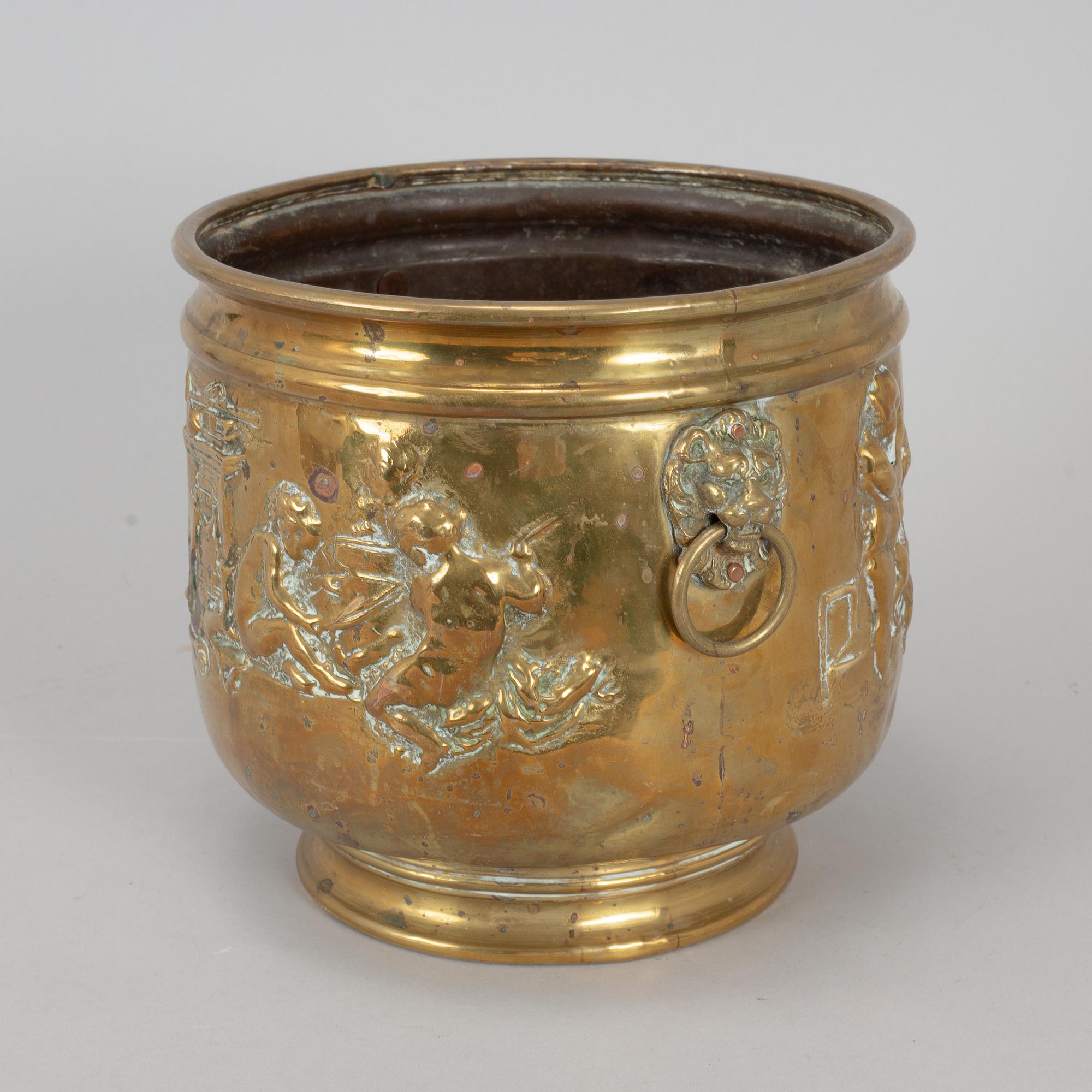 A 19th century brass flower pot.