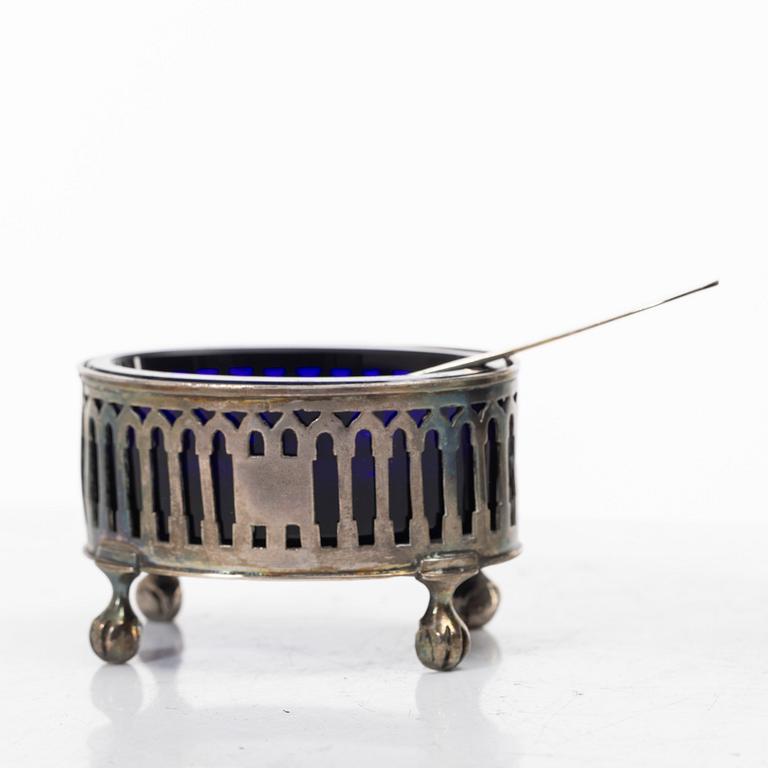 Two silver salt cellars, and a mustard pot, French hallmarks, late 18th Century.