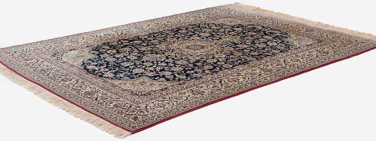A semi-antique Nain Tudeshk carpet, c. 307 x 206 cm.