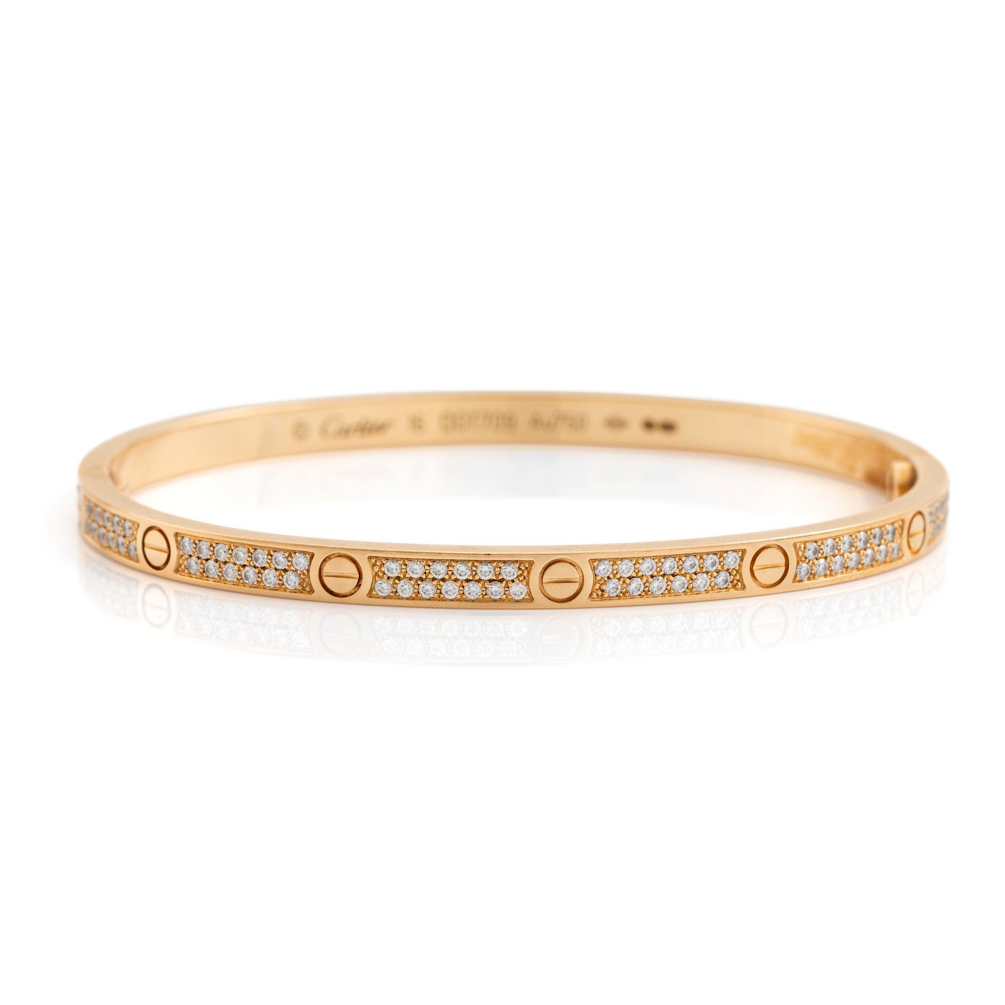 A Cartier Love bracelet small model in 18K gold set with round brilliant cut diamonds. size 16 total weight 17 g. Signed Cartier numbered DOT70. Bukowskis