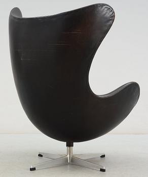 An Arne Jacobsen black leather 'Egg' chair, Fritz Hansen, Denmark, circa 1960.