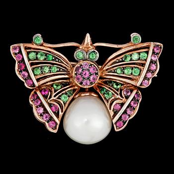 51. A butterfly brooch set with pink sapphires, tsavorites and cultured fresh water pearl.