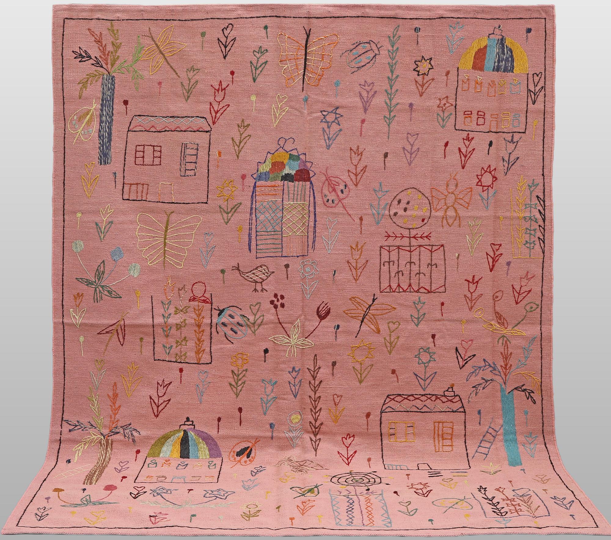 A Kilim carpet with hand-embroidered decoration, 237 x 180 cm.