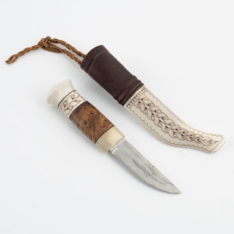 A reindeer horn knife by Bertil Fällman, signed.