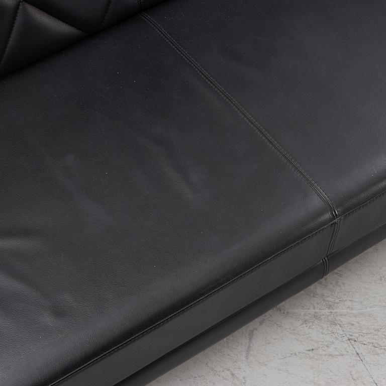 A leather upholstered sofa, 21st Century.