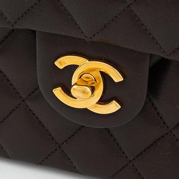 Chanel, A brown leather 'Mini Flap' bag, 1996-1997.