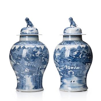 1135. A matched pair of blue and white Chinese jars with covers, Qing dynasty, Qianlong (1736-95).