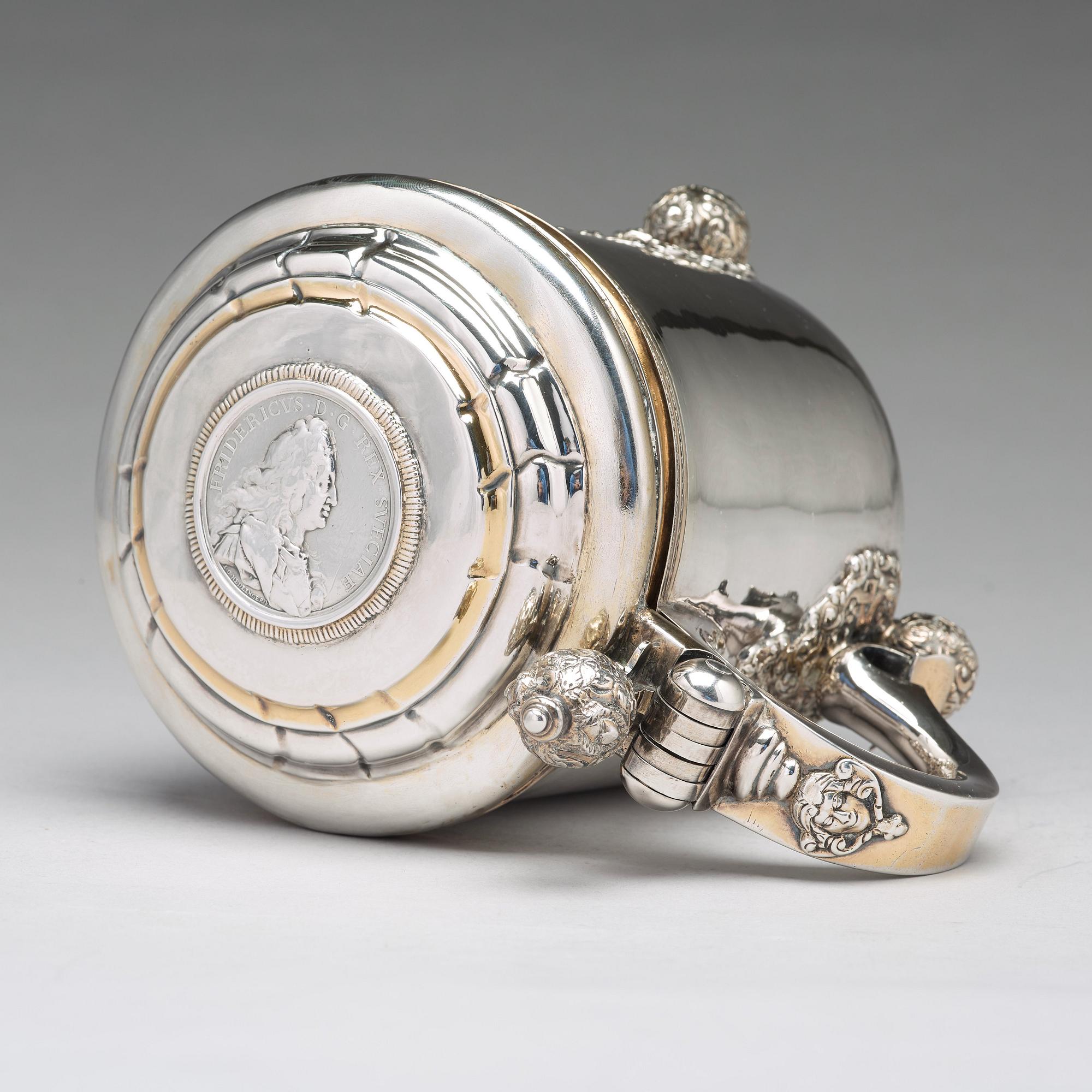 A Swedish 18th century parcel-gilt silver tankard, mark of Olof Lind, Mariestad (1752-1767 (1770)).
