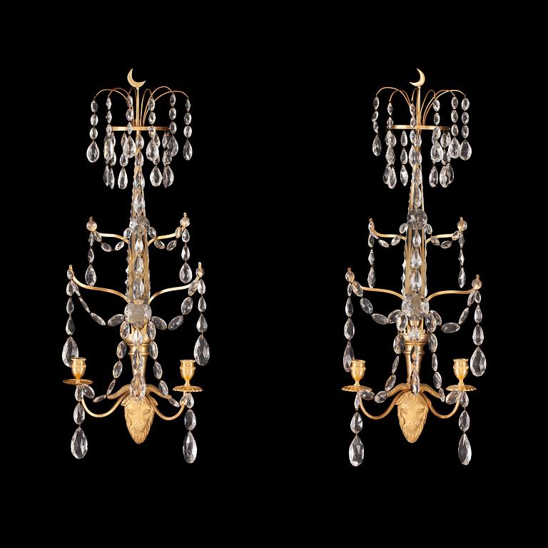 A pair of Gustavian late 18th century two-light wall-lights.