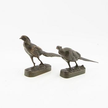 Decorative sculptures, a pair, 20th century, bronze.