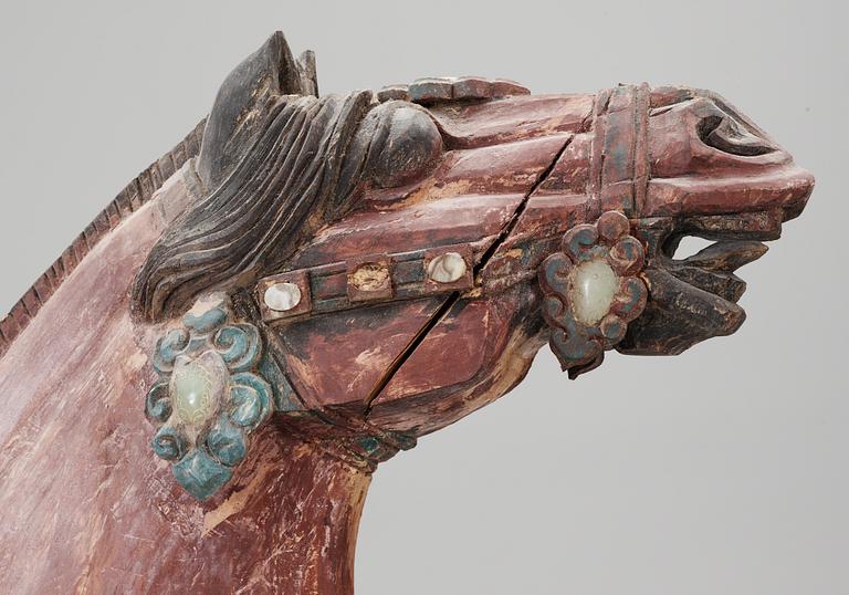 A large jade and agathe inlayed wooden carparisoned sculpture of a horse, presumably Ming dynasty.