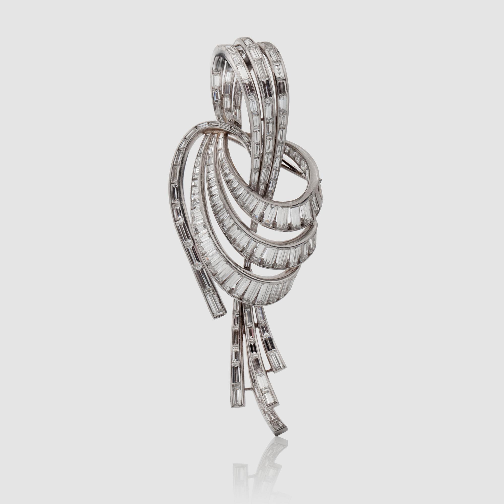 A circa 15.00 ct baguette-cut diamond brooch/pendant signed Harry Winston. Inventory number 3533.