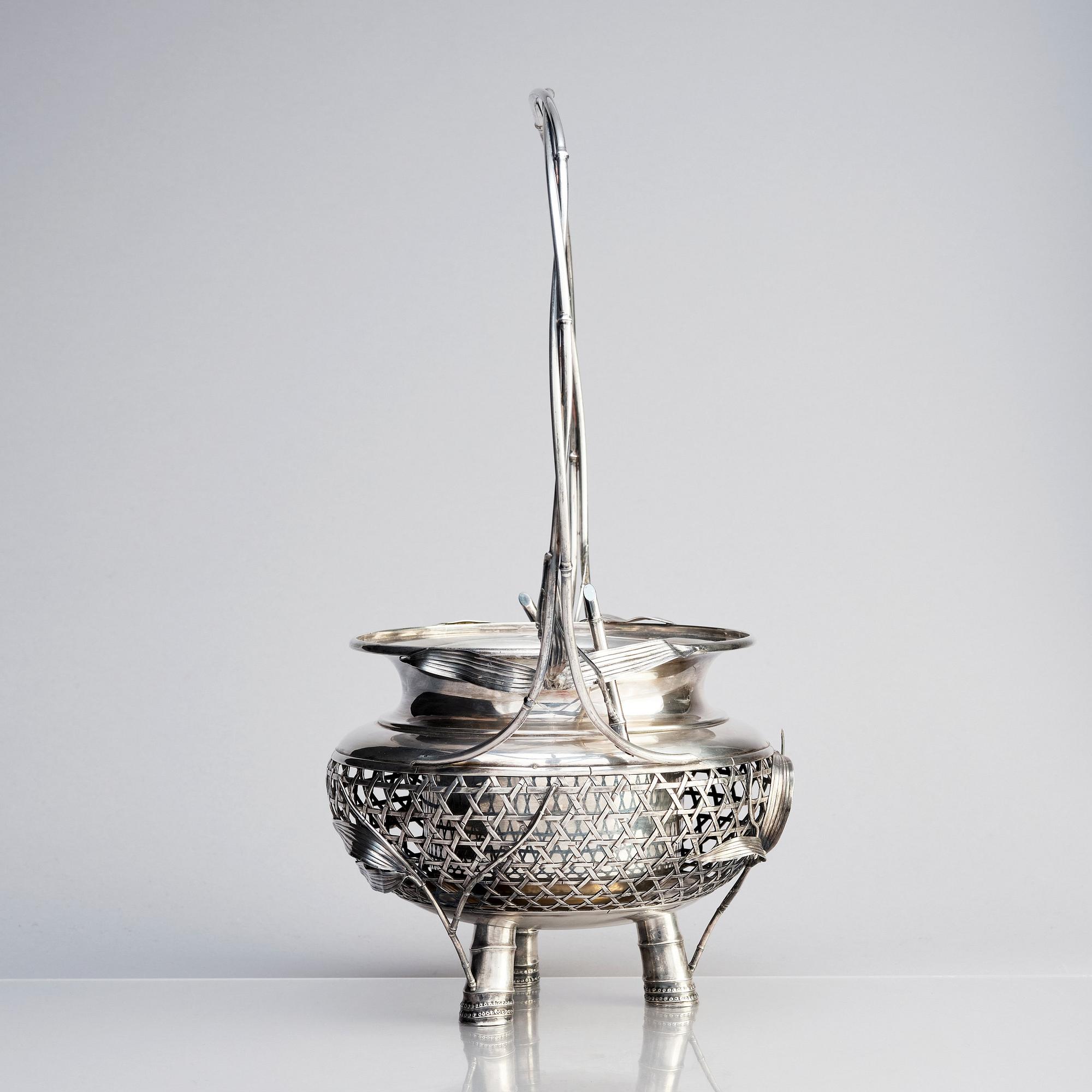 A Japanese silver basket, early 20th Century.