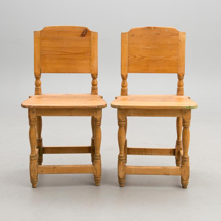 A pair of late 19th century provincial wooden chairs.