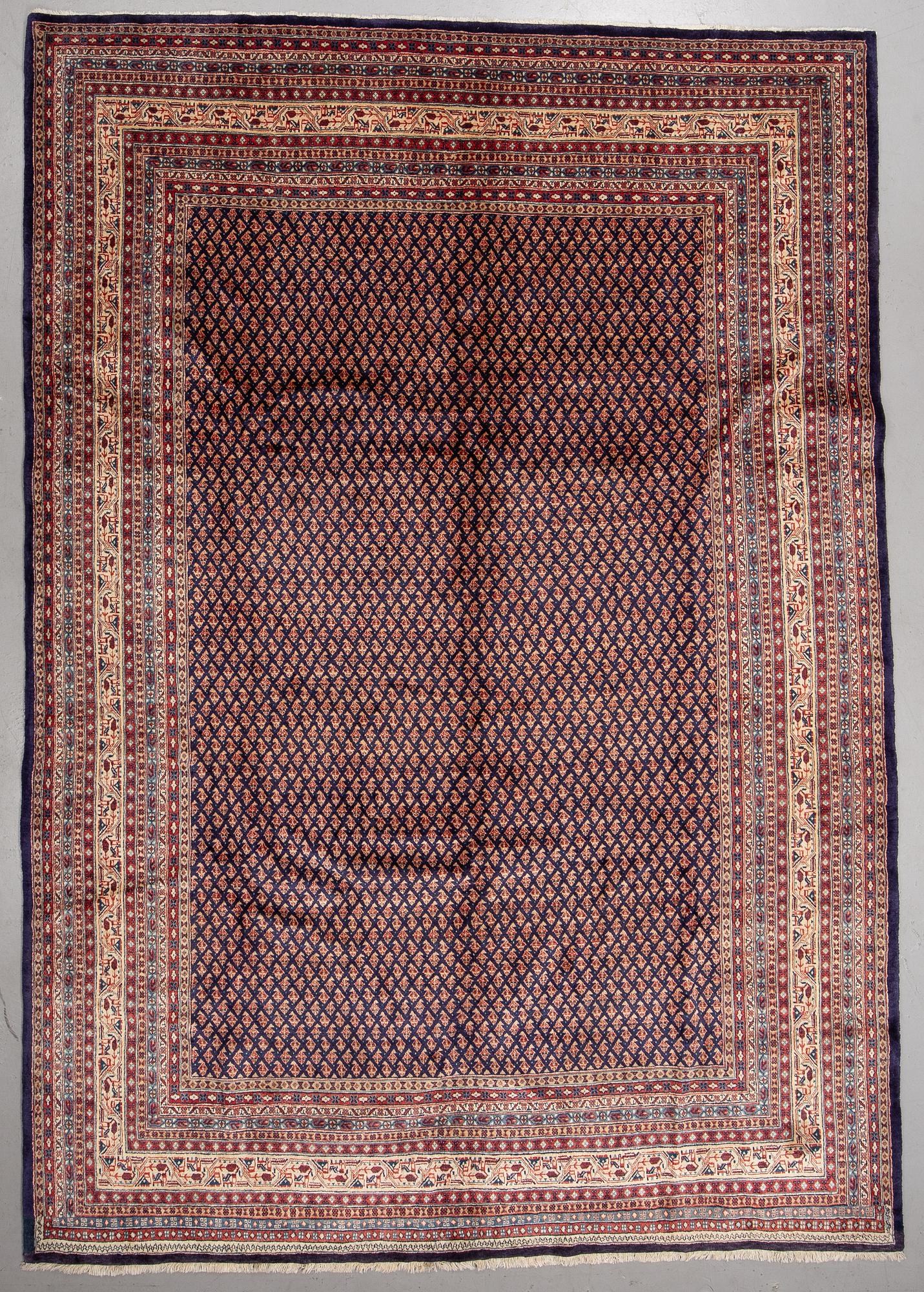 A carpet, Sarouk-mir, 372 x 260 cm.