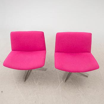 A pair of Corvette Fine Design easy chairs 21st century.