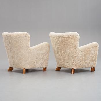 FRITZ HANSEN, a pair of easy cahir , model "1669".