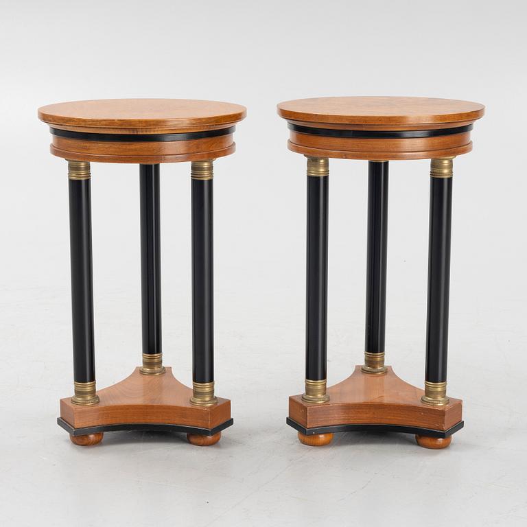 A pair of Empire-style side tables, later part of the 20th century.