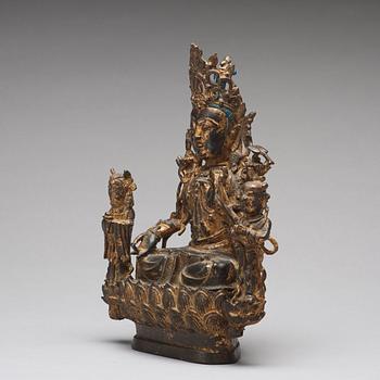 A bronze sculpture of boddhisattva and two attendants, Ming dynasty (1368-1644).