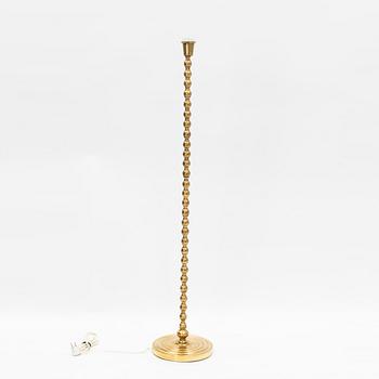 A brass floor light, Aneta, later part of the 20th Century.