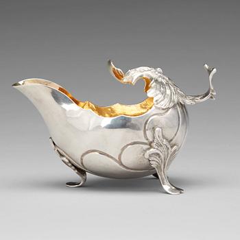 157. A Swedish Rococo parcel-gilt silver cream-jug, mark of Isak Sauer, Stockholm 1766.