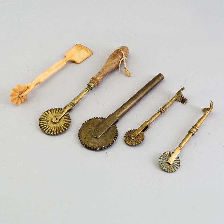 FIVE BAKING UTENSILS, bronze, bone and wood, 18th century.