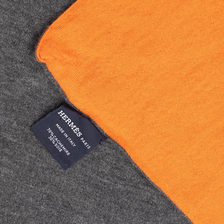 Hermès, a cashmere and silk mix scarf.