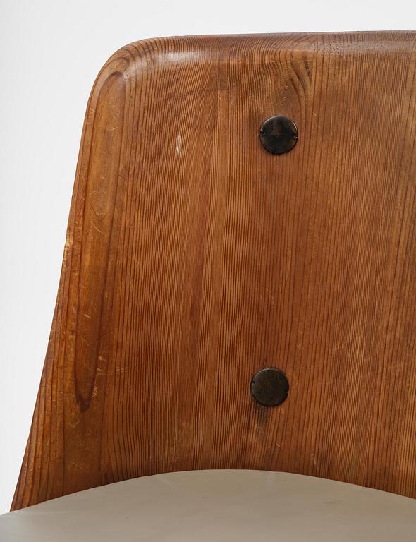 Axel Einar Hjorth, a pair of stained pine "Lovö" armchairs, Nordiska Kompaniet, Sweden, 1930s.